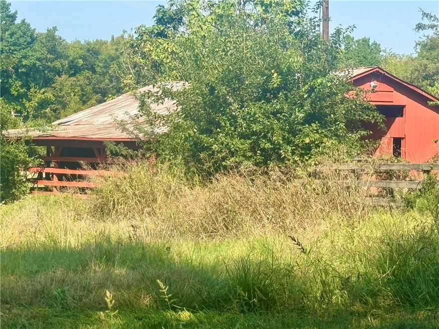 Prime Real Estate located in the south part of Fayetteville.  Easy access to and from I- 49  and Hwy 71 B
Just minutes from the U of A .  Great Development Potential for a subdivision. Zoned residential Single family homes.  There is a pond with steam side protection located at the northeast corner of property. 
Utilities are at the Street.  Great Opportunity to build a dream home with lots of acreage close to town, or if you are looking to move right in check out MLS number 1324604 which is also for sell with house and 3/4 acre 1855 sq ft with pool.