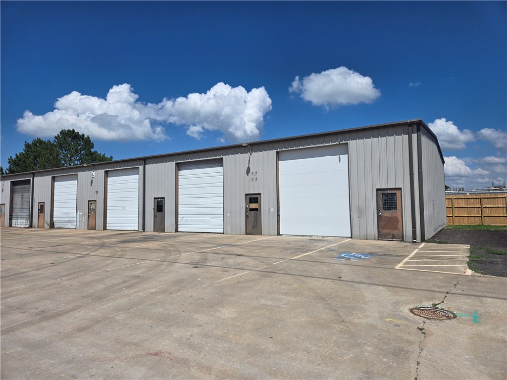 Triple-bay, climate-controlled, centrally-located commercial warehouse space near Springdale Municipal Airport available Jan 1, 2026! A fantastic opportunity to secure 3,450 square feet of expansive space to suit your business needs. Three large, 14' overhead bay doors ensure convenient access for loading and unloading into the three combined units. The space is equipped with two mini-split air conditioning units and 3 gas heaters to maintain a comfortable working environment year-round. Interior bathroom for convenience. Tenant responsible for all utilities. Establish a stable base for your business operations with this strategic industrial park location which also offers excellent connectivity to major transportation routes to support the logistical operations for your business. Whether you require storage, distribution, or manufacturing space, this warehouse provides the ideal setting for your operations. Contact us now to schedule a viewing!