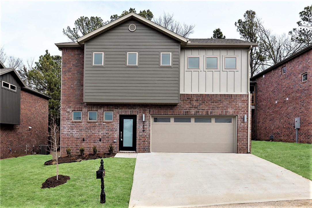 Located in Midtown East Fay, this home has an open floor plan w/ custom finishes. Stainless appliances, gas range, granite tops, ceramic tile, hardwoods, carpet, shiplap surrounded gas fireplace, designer lighting & plumbing fixtures, 2 car garage, POA maintained yards, low maintenance brick exterior & screened porch overlooking a tree preserved green space. Just minutes from the U of A, UAMS, VA & both Dickson St & Uptown Fayetteville make this property simply a smart choice and excellent value. All kitchen appliances are included