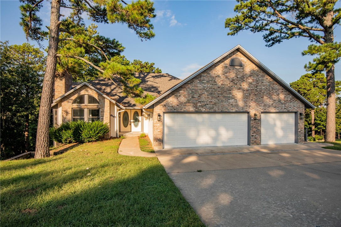 Beautiful, must see home in the desirable Crow's Nest subdivision in Rogers near Beaver Lake. Just minutes from the Hwy 12 bridge and Prairie Creek Marina; this beauty is move in ready!! 3
bedrooms and 2 bath home, with the bedrooms being on the main floor with the living room, hearth room
and kitchen. Downstairs you will find a bonus/media room, the laundry room, and another room that could
be used as and office or exercise room with access to the exterior. Enjoy the tree top rolling hill views
from the master bathroom and covered deck. This home is a must see and only 10 minutes from
Downtown Rogers.