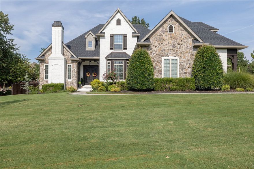 Spectacular home in one of Northwest Arkansas most desired neighborhoods, Thornbury Subdivision! This home showcases stunning updates throughout, including new paint inside and out, new roof and gutters, new fully covered patio with a large wood burning fireplace for extra comfort outdoors, plus many more amazing upgrades! It features four bedrooms, plus a bonus and an office with its own fireplace. Three full baths, one half bath, mudroom with lockers! The great room has vaulted wood beam ceilings with a new, all stone floor to ceiling fireplace, adjacent to the eat in kitchen with gorgeous custom granite counter tops. There are too many upgrades to list, so come see this immaculate home for yourself today!