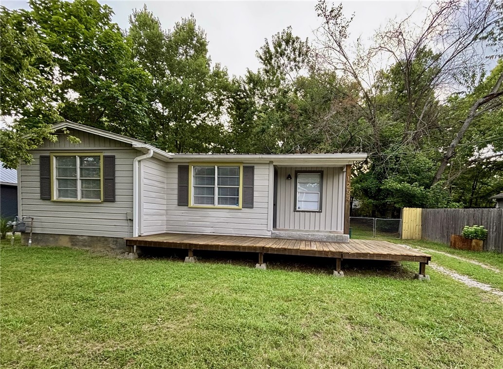 Charming South Fayetteville bungalow for rent! 2 bedrooms, 1 bathroom in an absolute ideal location! Less than one block from Walker park (disc golf, splash pad, skate park, etc), short walking/biking distance to the Razorback Greenway Trail, Crisis Brewery, Arsagas, Woodstone, Southyard, the Farmerās Market and all things downtown Fayetteville! Lots of natural light, front and back porches and HUGE fenced backyard with a garden area. This is the perfect oasis in the middle of town! 3rd bedroom has been converted to a laundry area with extra space available for an office, exercise or hobby room. Metal storage shed is perfect for storing bikes, kayaks, etc. All appliances included.
