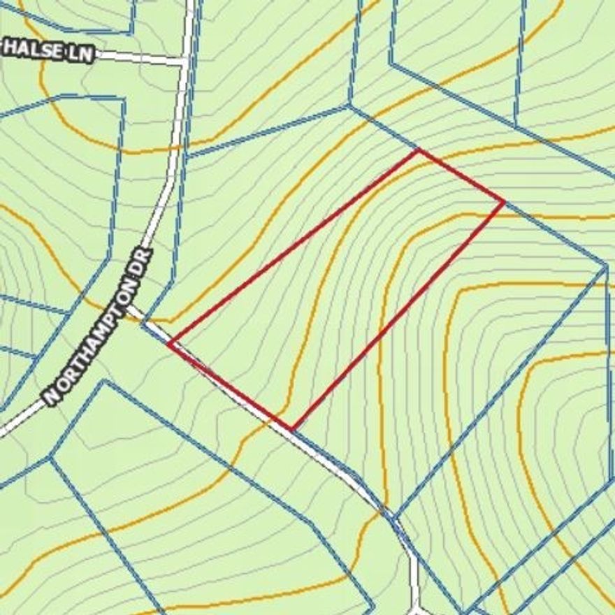 Beautiful, wooded lot sloping to common property. This buildable property has water at the street and is in a developed area near the Back 40 Trail System, on the east side of Bella Vista.