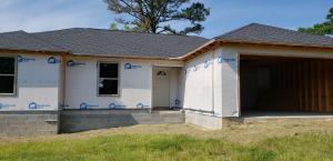 Buy and finish the way you want. This home is laid out to be a 3 bedroom 2 bath with open floor plan and garage on 1.51 acres. The seller will install septic and finish driveway at this price, otherwise nothing else will be completed.