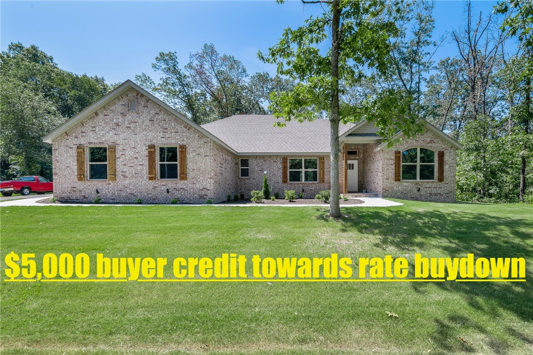 Brand New Bella Vista Beauty IN BENTONVILLE School district! 2 bdrm+OFFICE/2 bath home on desirable CORNER flat lot near Lake Windsor & Kings Wood Golf Course. This most popular open concept/split bedroom floorplan boasts lots of natural light with high end quality finishes featuring hardwood floors in living/dining area, gas log fireplace, granite countertops, pantry, eat-in kitchen & WIC. Spacious master suite has spa like bath with double vanity, walk-in custom tile shower & soaker tub. Master walk-in closet connects to the laundry room. Excellent outdoor space with covered deck. $0 down payment. 100% financing. Rural development loan.