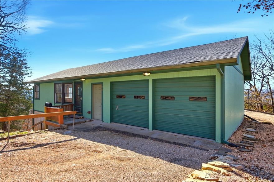 Cabin-style home with incredible panoramic views of the Ozark Mountains! This 2-bedroom, 1.5-bath property has been nicely updated with new carpet, updated flooring, modern appliances, and brand-new Anderson windows that bring in tons of natural light and really showcase the scenery.
Upstairs, you’ll find an open and easy-flow layout with the kitchen, living area, and a bright all-season room—perfect for kicking back or hosting while enjoying the views. Downstairs offers two comfortable bedrooms and an additional living space, all positioned to take in the beautiful Ozark landscape. Whether you’re looking for a full-time place or a weekend escape, this home offers great updates, a functional layout, and views that are hard to beat.
Working like new chairlift included!