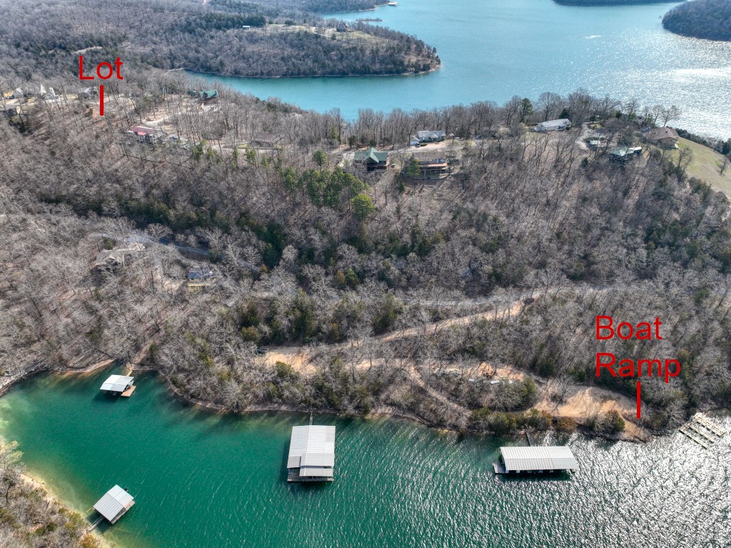 This lot would be a great spot for your full time or weekend get-away home! The footers have been poured, electricity is available, water has been run to the lot, so your building project is already under way! Access to this well established subdivision is on paved roads and Starkey Marina is close by as well as a boat ramp that is located in this subdivision. Owner financing is possible on this lot. House drawing and floor plan are what the foundation footers were designed for.