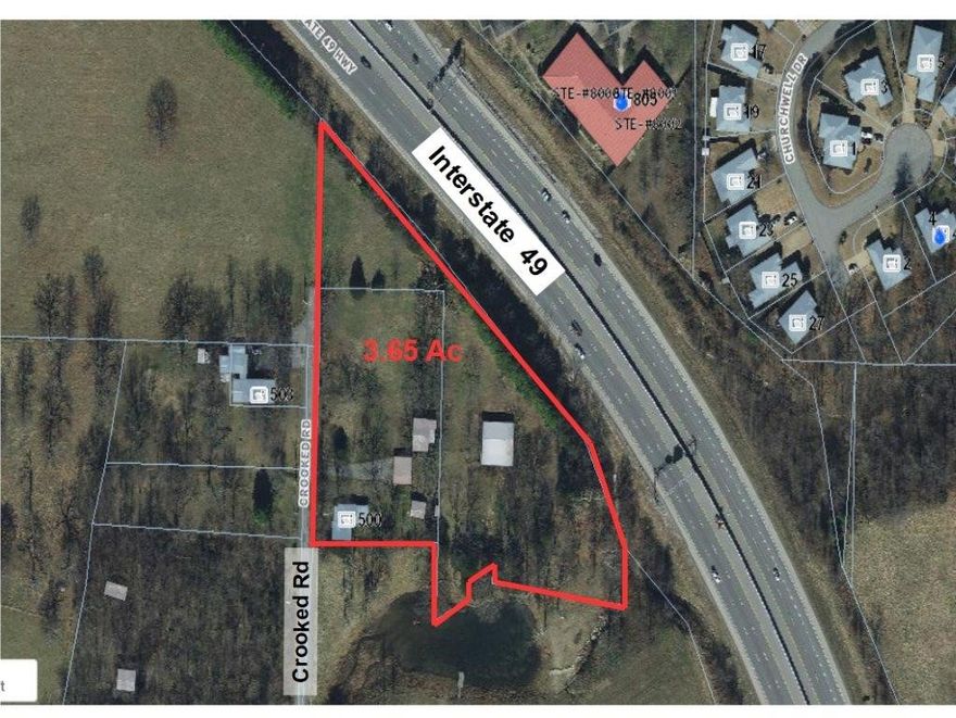 3.65 acres in fast growing Bentonville locale. Over 400’ of frontage on I-49 at the Central Ave exit (88). It is hooked up to city water and sewer is in the area. The older farm home and 3 outbuildings are of negligible value to the property, but usable. More adjacent acreage is available, see MLS #'s 1180338 & 1180814.