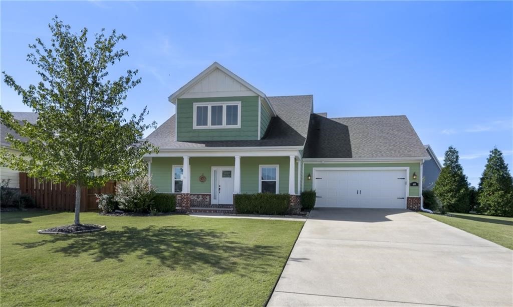 Adorable 4 bed, 2.5 bath home within minutes of shopping, restaurants, trails, parks, and I-49. Spacious, open layout. Primary suite & additional bedroom on main level, and 2 bedrooms with full bath upstairs. The primary suite has a walk-in shower, tub, and oversized walk-in closet. All Bosch kitchen appliances and washer/dryer included! Murphy bed will stay. Privacy fence with covered patio. Tenant is responsible for lawn and yard care. Pets considered with additional pet deposit. $2495/month and $2500 security deposit. Avail now!