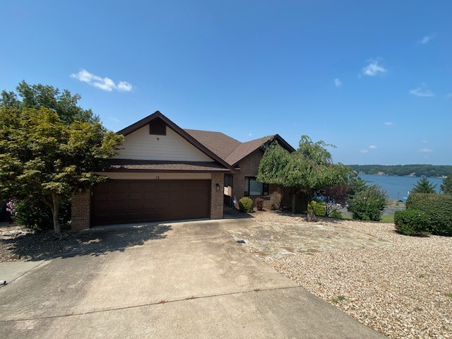 Enjoy stunning lake views from your living room and kitchen on Lake Loch Lomond! This beautiful home is mostly furnished and features 4 bedrooms, plus an office, 3 baths and a 2 car garage. The main floor consists of 3 bedrooms, office, 2 living areas, kitchen and dining area. The lower level consists of an additional master suite and living area. Just steps away from Lakepoint Restaurant & Event Center! Tenant can use the golf cart provided to access the boat dock but boat is not included.