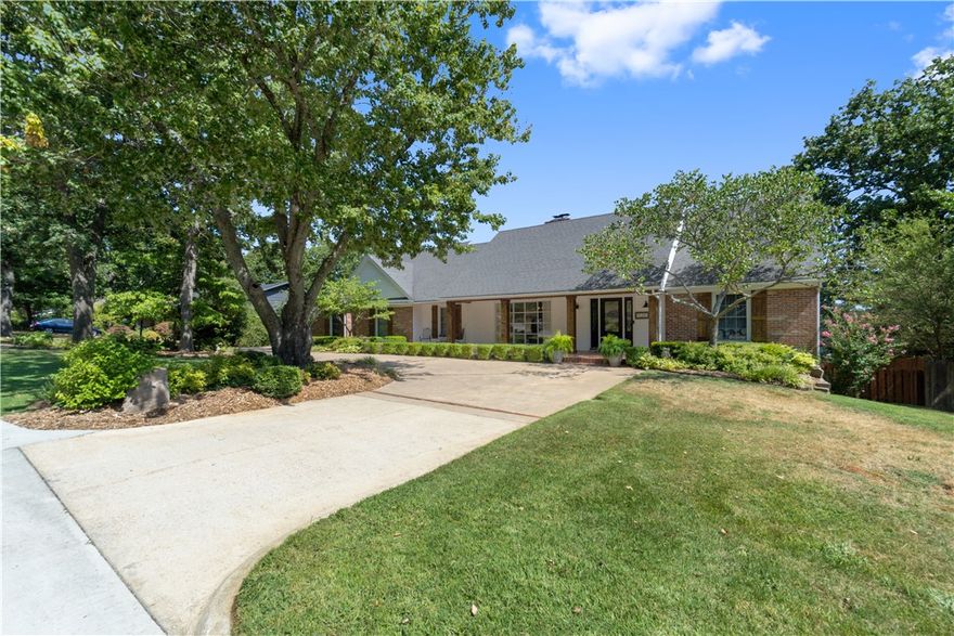 Fully furnished basement with all furniture, pool table, shuffleboard table, home gym equipment conveys as well as all outside poolside patio furniture. Established East Fayetteville location with tasteful updates & classic charm, this 4-5 BR, 3-1/2 BA, 4500sqft home has it all. Main level master with expansive closets, spacious living, dining and kitchen areas on main level for entertaining like a pro. Upstairs has 3 generous-sized bedrooms with abundant closet space, built in desks and Jack & Jill bathroom. Basement level is perfect for entertaining with enviable game room, media room & wet bar. Add’l bedroom/office & bathroom on this level, as well as a true gym. Large basement storage room. Easy access to backyard from this & main level to park-like yard with in-ground pool. You will find storage galore throughout the home. This house is a family and entertainer's dream home. Close to schools, restaurants and everything Fayetteville has to offer.  Don't let this one get away!