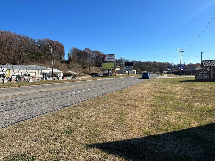 Great commercial lot on By-Pass, with high traffic count, be perfect location for bank, restaurant, or any type of retail space.