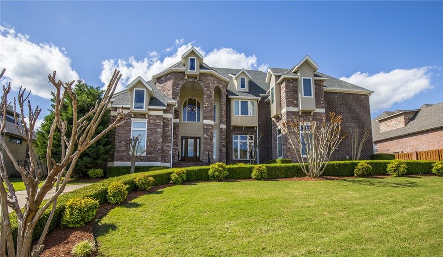REDUCED in Pinnacle Country Club! Vacant - easy to show. New roof in 2020. Home Warrant provided by seller. The entrance welcomes you with a grand staircase, Formal Dining Room & Formal Living Room with soaring ceilings. Natural light shines through from grand windows with elegant window coverings. The Brazilian Cherry floors throughout the entire home add warmth. Large kitchen has gas 6 burner w/griddle range, 2 dishwashers, 2 pantries. Lovely glass display cupboards open up to family room. Upstairs boasts 2nd Master, which could be bonus/game room, and 3 other bedrooms with their own private bath, and Exercise room as well. The outside backyard has 2 areas for relaxing and entertaining. 20x15 Arbor area, and a covered kitchen with gas grill, and a wood burning fireplace. This is a must see!