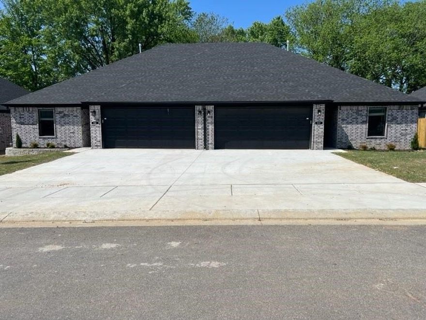 Beautiful & well-maintained duplex in Gentry! This spacious floor plan includes the split floor plan design and open concept from living to kitchen. Enjoy the features this home has to offer, such as the custom cabinets, custom interior design, undermount sinks, and energy star appliances! Photos of house with the same floor plan.