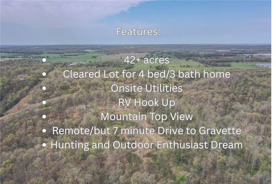 Highly Motivated Seller! Discover your own private mountaintop retreat with this secluded 42.71-acre property featuring a manufactured home and breathtaking 360-degree mountain views. This unique parcel offers a rare combination of peace, privacy, and readiness—perfect for those looking to escape the hustle and build their dream home in nature. The land has already been partially cleared and comes equipped with electrical and septic systems, fully set up for a future 4-bedroom, 3-bath house. An 850-foot well provides clean, reliable water, making the property ideal for full-time living, a weekend getaway, or even a homestead. Wildlife is abundant, with frequent sightings of deer, turkey, and other native animals. Enjoy sunrise and sunset views from your own mountaintop, surrounded by nature’s beauty and tranquility. Live comfortably in the manufactured home while planning your custom build or simply enjoy the land as a private escape.  Also listed in Residential with MLS Number 1304591