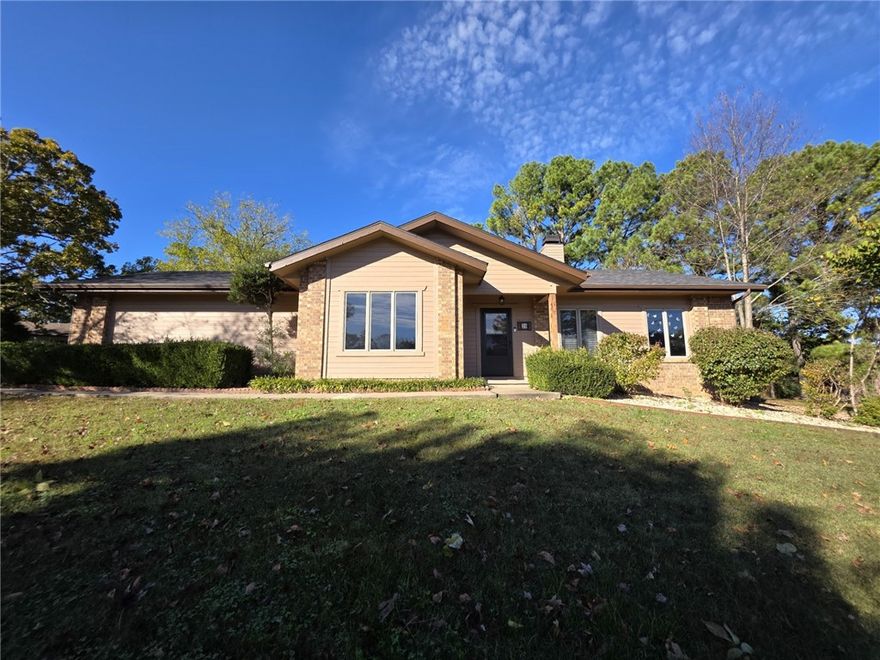 This 3 bedroom, 2 bath home has been lovingly maintained. Beautiful built-ins flank both sides of the gas log fireplace in the living room. The kitchen has been fully updated with granite counters, stainless steel appliances and tons of storage. Master bedroom features a walk-in closet and en suite bath with walk-in shower. Wood floors throughout, no carpet! Oversized garage with extra refrigerator. Covered back patio with furniture for tenant's use. Owner provides lawn care.