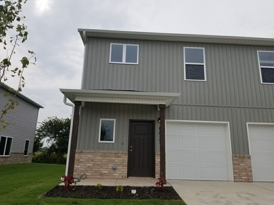 You can be the first occupant of this new home and receive a 50% discount on your first month's rent. New two-story home, the foyer flows down to a welcoming and airy main living space. It showcases a sprawling living room made for gatherings with direct access to a modern kitchen and an intimate dining area. Residing upstairs are all three bedrooms and a versatile loft, ideal as a custom work space. The owner's suite is tucked into a quiet corner with its own private bathroom and walk-in closet.