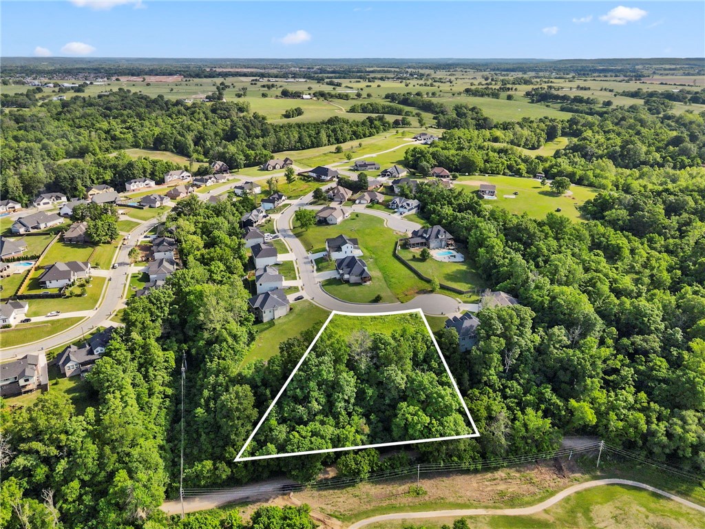 Double the opportunity in Pea Ridge’s Sugar Creek Community! Lots 36 & 37 are combined to create one spacious homesite — or the option for two. Tucked at the end of a quiet cul-de-sac with golf course views, this gently rolling property offers utilities at the street and quick access to schools, shopping, and all of NWA.