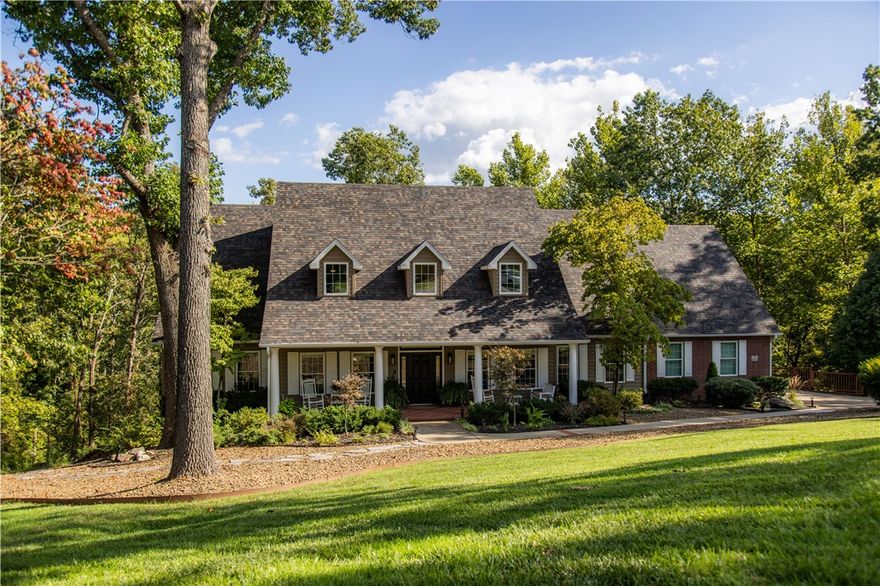 Set on 1.58 acres at the end of a cul-de-sac, this beautiful home offers both privacy and convenience. A welcoming porch invites you inside, where a formal dining and sitting room lead into a spacious living area with tall ceilings, skylights, and natural light. The kitchen boasts updated granite counters, new cabinet doors, hardware, and double ovens. An expansive deck extends the living space outdoors, offering peaceful wooded views. The primary suite is a retreat featuring a completely remodeled bathroom. Upstairs, 3 bedrooms plus a large bonus room with a kitchenette and bathroom, ideal for a game room or guest suite, provides versatility. Enhancing updates to the home are refinished floors, renovated bathrooms, new fixtures, refreshed fireplace, new hot water heater, interior paint, and more. Exterior improvements include new roof shingles, gutters, landscaping, and irrigation. With its extensive renovations and prime location, this residence is a rare opportunity to live in the coveted Lexington Subdivision.