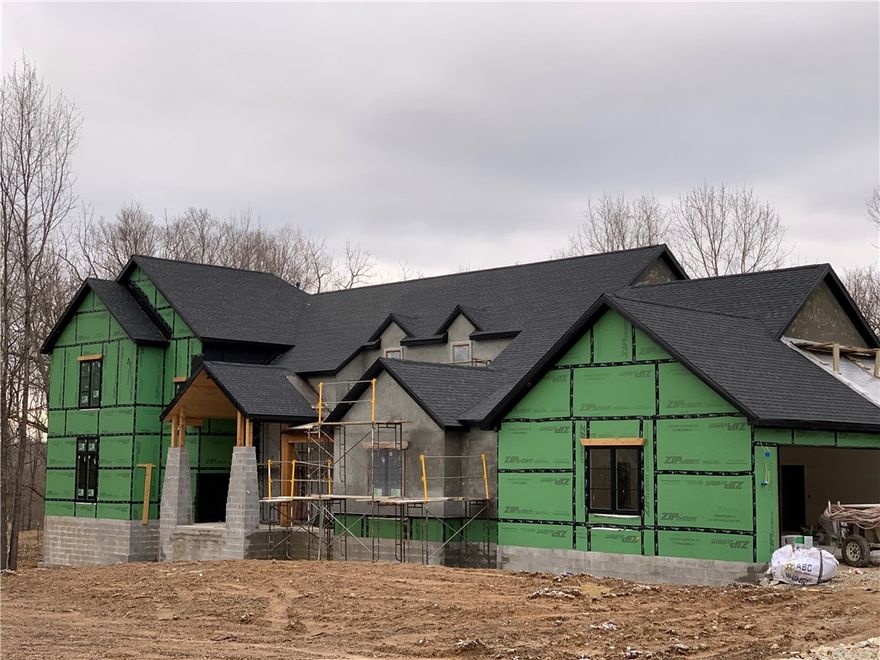 Luxurious new home under construction in Northeast Fayetteville area. Brent Gibson architectural design! Four bedrooms plus study, media room, fabulous master suite, four car garage and game room. The outdoor entertainment space overlooks the wooded three acres. Only $1,040,000!