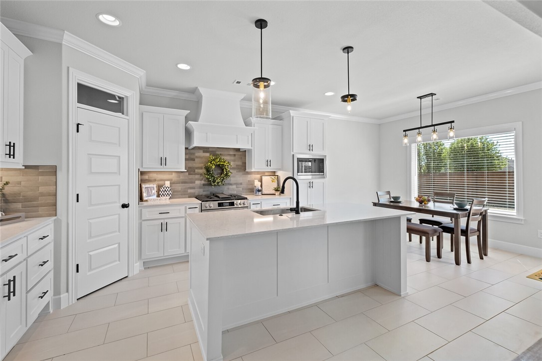 Welcome to the Pemberton Plan, a beautifully designed 4-bedroom, 2.5-bathroom split floor plan that blends style and functionality. The open-concept kitchen and living area create a warm and inviting space, perfect for gathering with family and friends. The primary suite is a private retreat, featuring a tray ceiling, a beautifully tiled shower, double sinks, and a spacious walk-in closet. Plus, enjoy the convenience of a 3-car garage. Don’t miss your chance to own a home in this sought-after community! Schedule your tour today! The pictures are not of the actual home, but similar plan and finish. The house is still under construction. The seller will pay up to $3,500 towards closing costs with the buyer's lender of choice. In addition a preferred lender credit of $3,000 when using builder's preferred lender.