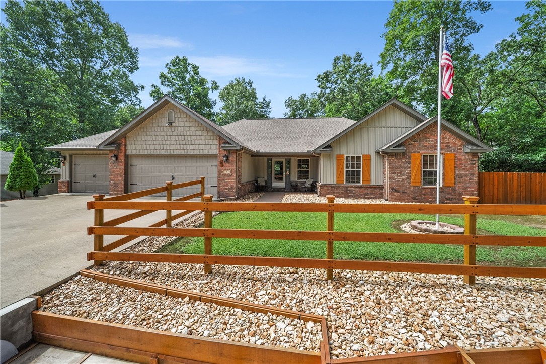 Fall in love with this perfectly remodeled and extremely well-kept home in the desirable Reighton community in Bella Vista. Nestled on this Cul-de-sac, you are unlikely to find a better maintained home than 2 Reighton Dr. Beautifully appointed inside and out, this single level turn-key home is move-in ready. The deep double garage spaces allow room to spare in the three car attached garage! The lighting throughout the house is outstanding; notice every sink and cabinet is clean and attended, and every closet organized and clean! From the water control efforts in front of the home to the gate in the backyard that opens on the back 40 trail system, this home is perfect for your family and the outdoor life that we all adore in Bella Vista! Roof was replaced in Sep. 2021. Privacy fence is new. Electric circuits in the garage and crawlspace are all conduit and labeled with a level of organization not seen in most homes. Come and visit this perfectly neat and organized house!