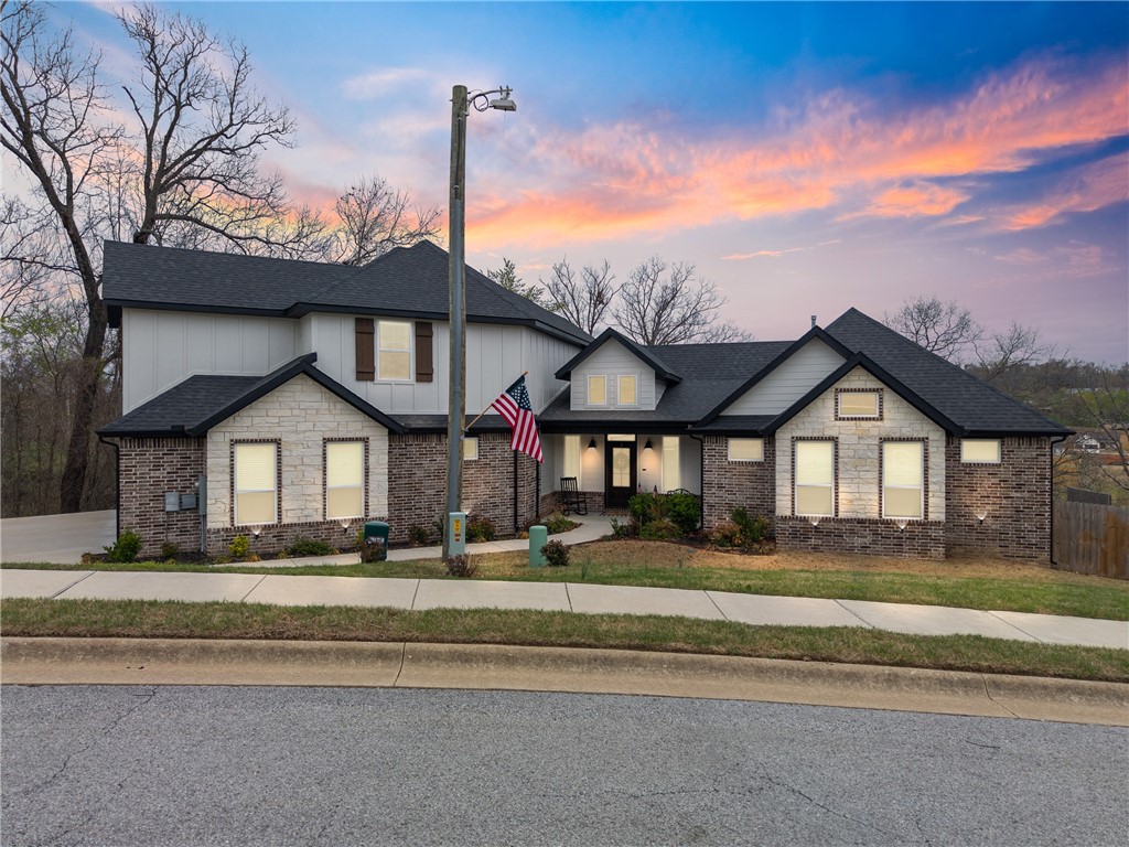 Discover the perfect blend of comfort and space in this exquisite 4-bedroom, 3-bathroom home, offering a generous 3,393 square feet of elegant living space. This newly listed property promises an exceptional lifestyle in the heart of Pea Ridge. The house invites you inside with a well-designed layout that emphasizes both privacy and gathering spaces. The primary bedroom, complete with an en-suite bathroom, serves as a peaceful retreat at the end of a busy day. The additional bedrooms are spacious and adaptable, ready to accommodate your family or home office needs. This 3 car garage features a Tesla charger. The expansive lot is a blank canvas ready for your landscaping dreams ā whether that's a vibrant garden, an outdoor entertainment area, or a playground for kids. The neighborhood further enriches living here, characterized by quiet streets and friendly faces, ideal for evening strolls and bike rides.