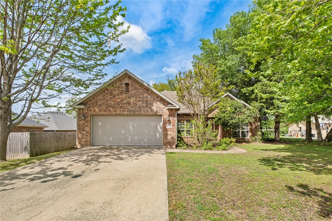 Location, location, location. Welcome home! This charming 3-bedroom, 2-bath residence is nestled in one of Fayetteville's most desirable locations, near Fayetteville schools, Holcomb Elementary, the University of Arkansas, and just 2 minutes from I-49. If you're looking for convenience and comfort, this home has it all. Inside, you'll find a spacious open concept layout connecting the living, entry, and dining areas, ideal for both everyday living and entertaining. The kitchen is well-equipped with stainless steel appliances, granite countertops, a bar, and breakfast nook that opens into a cozy living room complete with a fireplace. Storage abounds with a large garage, ample closets, and attic access. Don’t miss this opportunity to own a beautiful home in a prime location!