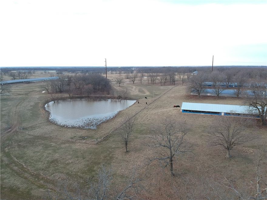 Cattle Ranch with excellent grazing and hay production opportunities!  The land itself is beautiful with gently rolling hills, large ponds and ~30 wooded acres on the East side. This property includes 130+/- acres of productive forage grass and 11 Poultry Houses.  Six of the poultry houses were sub-leases as recently as 2016.  The remaining houses have been used for hay storage, equipment storage and cattle barns during inclement weather.  The possibilities with this property are endless!  Poultry houses could be converted to permanent cattle barns, feeding facilities or disassembled and sold for scrap.  Access to Decatur water, natural gas and electricity make this property perfect for starting or expanding a cattle operation with great access to year round forage and water.