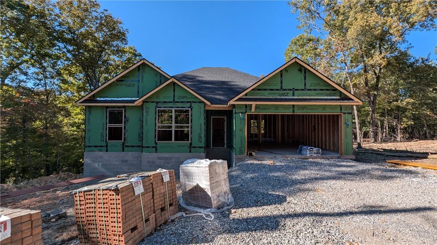 Rates As Low As 4.875%! Welcome To Your Next Home! Fall In Love With This Fantastic New Build Ready Mid-January, With Still Time To Make Selections! This Oneās Got The Look And The Layout ā 3 Bedrooms, Split Floorplan, And 9-Foot Ceilings Minimum Throughout That Make It Feel Open And Bright. The Vaulted Living Room Ceiling Steals The Show (Optional Beams Available For That Extra Wow). The Kitchen Brings Major Function And Flair With Custom Cabinets, Granite Counters, Tile Backsplash, Island With Bar Seating, Pantry, And A Spacious Dining Area. The Primary Suite Offers Dual Vanity, Tile Shower, And Walk-In Closet In The Primary Bath. Cool Factor - The Primary Closet Connects Through The The Laundry/Utility. Storage Is Tucked Throughout ā Every Inch Designed With Real Life In Mind. Step Out Back To A Covered Deck Overlooking A Soon To Be Freshly Sodded Usable Back Yard And Peaceful Views.