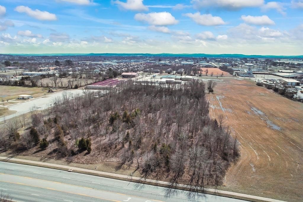 Prime location with excellent access and visibility. Over 700 feet of road frontage, creates endless possibilities. Development potential in industrial park area close to Tyson, Rockline, Cintas and UPS. Close to proximity to the Jones Center & downtown Springdale. Ideally located with 5 lanes to I-49 with close access to 412. Come check out and make your dreams come true!
