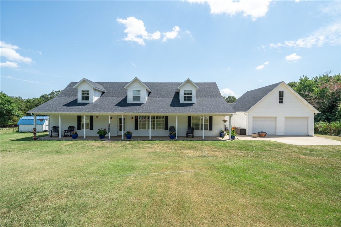 This beautiful property is loaded with highly sought-after features! The main house and original farmhouse each sit on their own parcel, totaling 32.39 of secluded acres! The spacious main home offers four bedrooms each with its own walk-in closet plus bonus room. An additional 326 SF heated and cooled bonus room above the garage - would make a perfect home office!
Enjoy peaceful views of the spring-fed pond, raised garden beds, with approximately 30 acres of fenced pasture. The land features 7 paddocks ideal for rotational grazing. Three barns equipped with electricity and sub-panels, two storage sheds and organically maintained/pesticide free land make this a true homestead.
Recent updates include a new roof (2022) plus new carpet, paint and stainless-steel appliances (2024). The original 1,000 SF farmhouse could be finished as guest quarters or sold separately with its parcel.
Fiber internet ensures you stay connected while enjoying the privacy and beauty of country living!