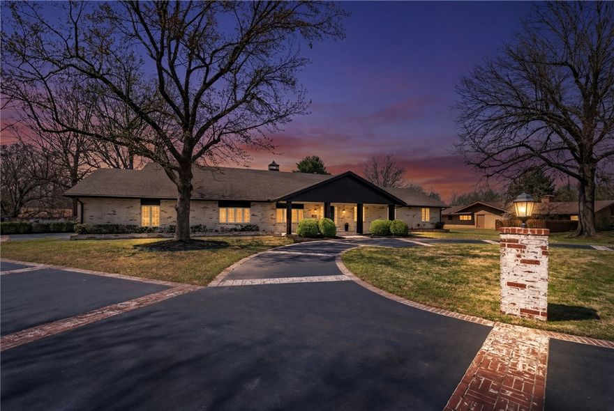 Welcome to a rare blend of historic charm and modern luxury in the heart of Springdale. This remodeled 5,300 sq ft home sits on nearly 3 acres within a subdivision, offering both privacy and convenience, while also being less than 2 miles from downtown! Inside, you’ll find thoughtfully updated living spaces paired with timeless character, featuring a private movie theatre, indoor sauna, and multiple areas designed for entertaining. Step outside to your own resort-style retreat complete with an inground pool, hot tub, private pond, and a full tennis court, creating a lifestyle that’s hard to match. Whether hosting guests or enjoying quiet evenings at home, every detail of this property is designed for comfort, relaxation, and elevated living.