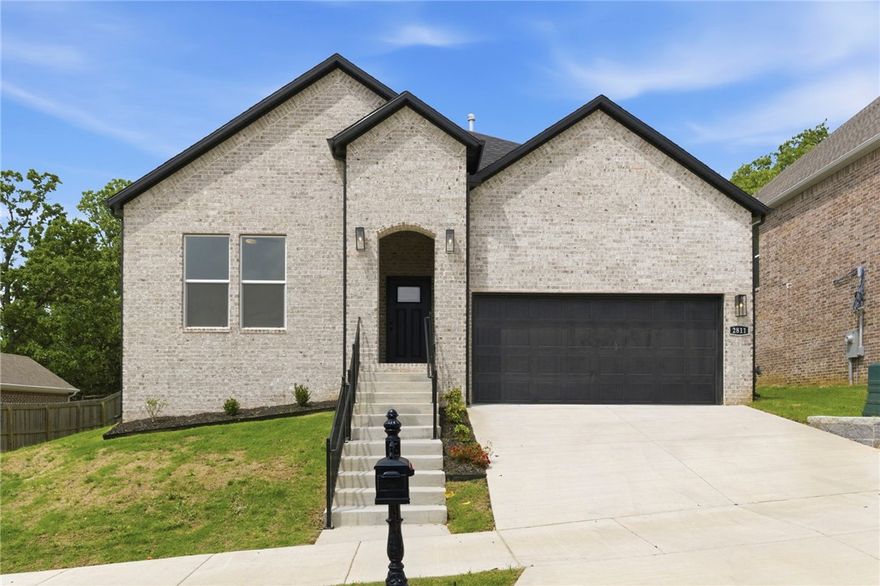 The Immaculate Ivory plan in Hughmount, located in Fayetteville, Arkansas! The Ivory plan includes 4 bedrooms, 3 baths, a game room (could also be a 5th bedroom!) and 2515 square feet. These brand-new homes boast 4-sided brick and LVP flooring with carpet on stairs and upstairs (per plan). Upon entering, you will find a spacious living area featuring a gas fireplace with a poplar mantle. The kitchen will have 42-inch cabinets, lovely appliances and quartz countertops and tile backsplash.  The Primary bedroom has a fabulous en suite, dual sink, with a walk-in shower with tiled walls and a soaking tub (per plan)! These homes feature LED lighting throughout, and a high efficiency AC with programmable Wi-Fi thermostat. Come find your dream home today! Taxes and Parcel TBD.