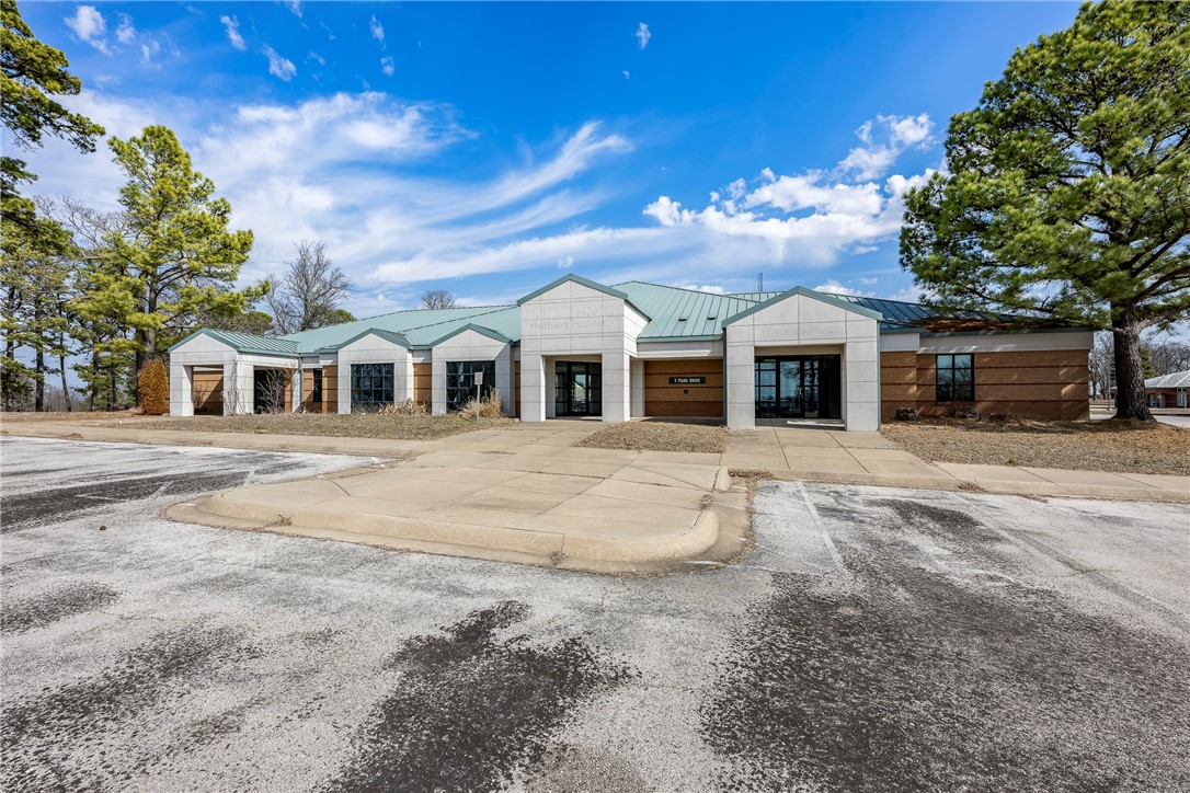 This versatile medical building sits on 2 acres in the heart of Holiday Island, offering endless possibilities for medical, dental, or spa services. Conveniently located near shopping and just minutes from Eureka Springs, this property provides an excellent opportunity for a turnkey practice or a new wellness retreat. With ample space and a prime location, this is the perfect place to grow your business in a thriving community!