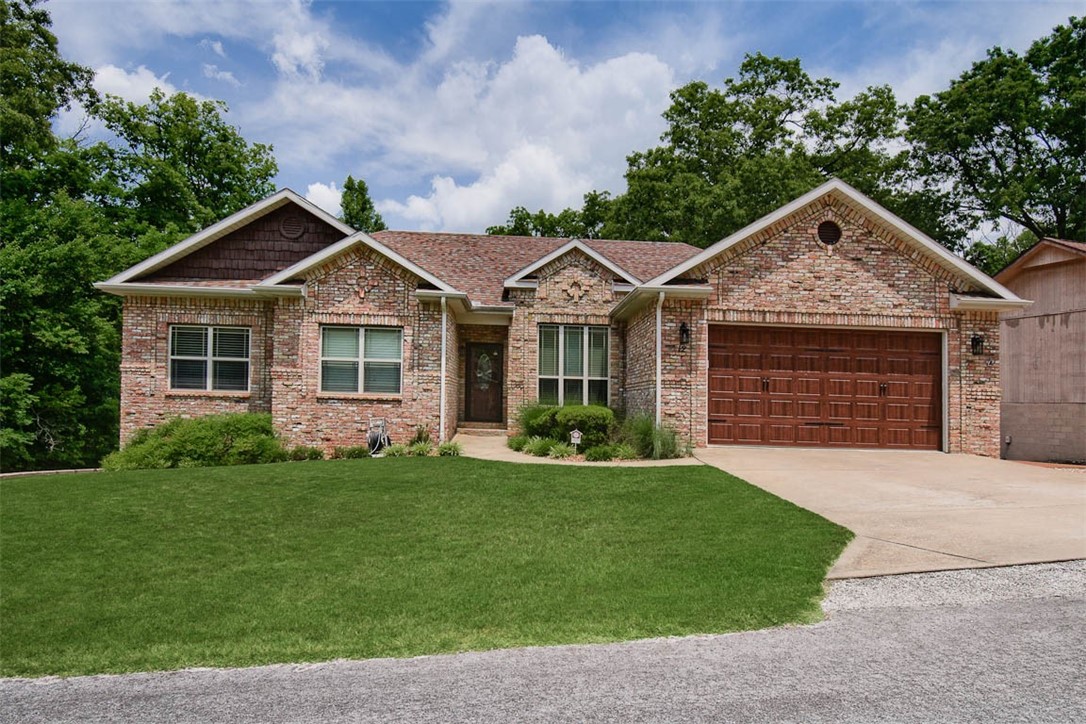 Welcome to this stunning custom-built home.
As you step inside, you'll immediately notice the thoughtful design that makes this place truly special.
Crown molding throughout the house.
Two bedrooms, two bathrooms, and office on the main level. The primary bathroom has a jetted tub and a spacious walk-in shower.
A gourmet kitchen with beautiful granite countertops and large double-door fridge make it the perfect place to whip up delicious meals. And don't miss the hidden walk-in pantry.
Wood flooring on the main level and a two-sided propane fireplace.
The lower level of this home can serve as a game room or in-law suite. It has a kitchenette, and polished concrete flooring throughout. The third bedroom and bathroom are also on the lower level.
In addition, this home has a tornado saferoom and a dedicated wine room.
Beautifully landscaped terraced backyard.
Recent updates include roof and furnace upstairs in 2018, water heater in 2019, furnace downstairs in 2023. triple-insulated garage door added in 2021.