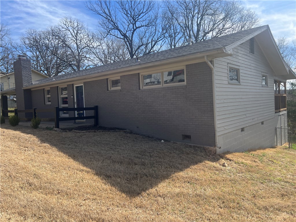 Cute 3 bedroom 1 full bath and 1 half bath very close to Downtown Harrison. Kitchen has just been remodeled and all the Ceilings refinished. House is move in Ready, living room/Family room is large and has a Awesome Covered Deck on the Back of the house 54 ft by 12 Ft to enjoy with friends and family. This house has a Carport, newer A/C and and roof in the last few years. Fully fenced in yard in the Back, Crawl space you can walk into, has room for a workbench. New Water Heater 4/25