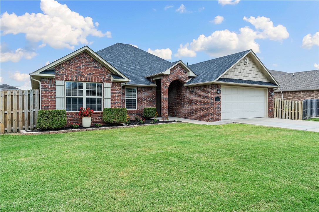 Absolutely move in ready all brick 3 bed, 2 bath home with a new roof in 2024! Such a wonderful home behind the gates of a quiet community in the heart of all the action of shopping, dining, and fun near Pleasant Grove in Rogers! The home has an open floor plan with plenty of light, light neutral colors and split floor plan. The kitchen has all the space you need for meal preparation and entertaining with granite countertops, Frigidaire appliances, a huge pantry and kitchen island. With ample storage, oversized garage and laundry room the home allows room to get organized and the space and layout functions well. Enjoy the Primary suite and quiet primary bath set away from the guest bedrooms for privacy and serenity with a big walk-in shower and soaking tub with 2 sinks and a large closet. This home has it all!