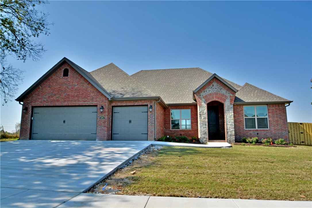 LANDMARC CUSTOM HOMES! Come see their newest neighborhood, West Landing! Beautiful 4 or 5BR/3BA/3 car garage home in SW Rogers! Office could be used as 5th BR! Open LR to Kitchen w granite counters, bar, island, custom cabinets, wall oven & eating nook!,Private master w tray ceilings, his & hers closets, his & hers vanities, w/i tile shower, jetted tub, & water closet! Feel like you're at the spa! This home is great for a family w young children - no stairs to have to worry about! MUST SEE!