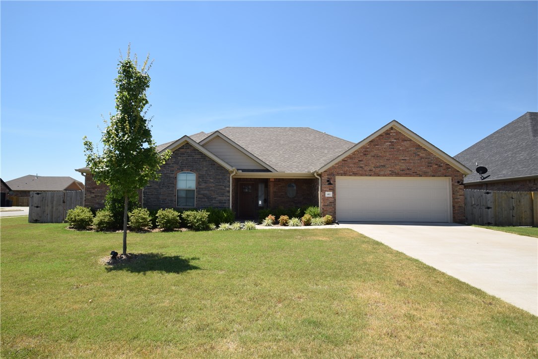 This very popular floor plan is now available in Westbrook! The perfect square footage to accommodate four spacious bedrooms and three full baths, and plenty of living kitchen and dining space for your family and guests! Among many things, you'll love the solid-wood front door, cathedral ceiling in Living Room, beautiful brick fireplace, cased windows with crown headers and crown molding, custom cabinets, open concept floor plan, granite counters, stainless appliances, oversized laundry room, large fully fenced back yard on a corner lot, and so much more! Additionally, the beautiful Westbrook community touts a community pool and pavilion, is within walking distance to Tontitown's City Park, and zoned for the very popular Bernice Young Elementary and Har-Ber High! Don't let this one slip away!