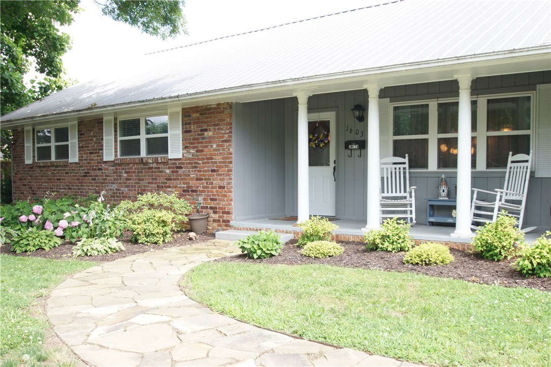 Don’t miss out…This one will go fast!!! This fantastic Rogers home has been meticulously maintained inside and out. Completely redone in 2011. This house has it all – Tons of Natural Light, Open Floor-Plan, Wood-Like Flooring & Gas Fireplace. The Kitchen features Granite counter-tops and Custom Cabinetry. Formal Dining area open to the living room. Metal Roof, Professionally Landscaped, Mature Garden, Storage Shed & 2 Car Garage. Huge, fully fenced backyard with beautiful Deck & covered patio.