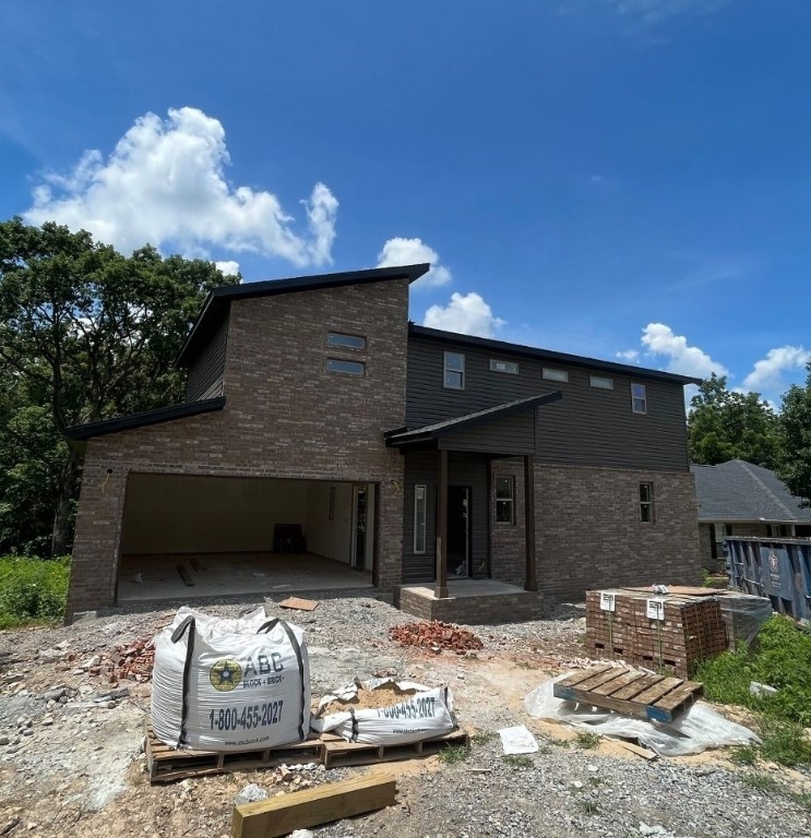 Check out this stylish new construction home located in the Highlands area in Bella Vista! It features two spacious bedrooms with walk-in closets, 2.5 bathrooms, and an open kitchen/dining/living room layout, along with a 2-car garage. Enjoy comfort and style with amenities such as 3 cm granite countertops, LED disk lighting, a Frigidaire Gallery appliance package, and full aluminum guttering. The home is conveniently located near Lake Loch Lomond, bike trails, and is just a short drive from downtown Bentonville!