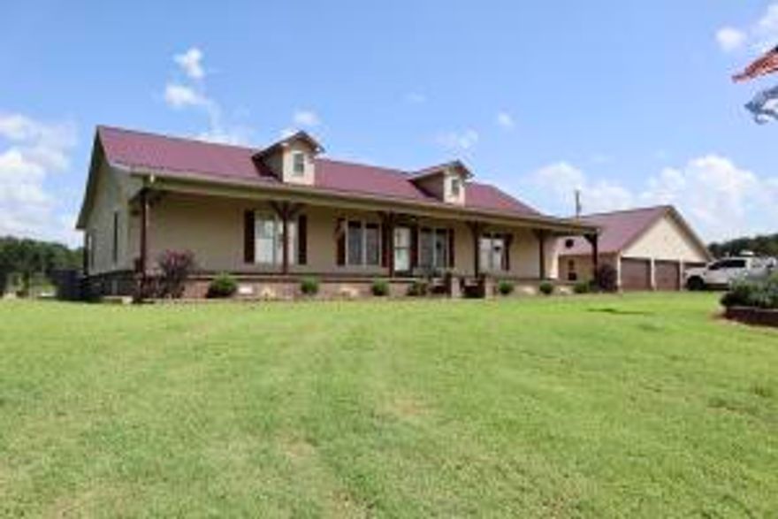 3 turkey houses, two 40X500 and one house 40X530. All updates completed in last years including new alarm system. 40X60 litter shed, 40X60 equipment shed. 75 KW generator diesel,  5 propane tanks. 2244 sq ft house with 640 sq ft mother in law quarters. 3 Car garage. 600 sq ft of porch. 16X32 inground pool, 83.69 acres of pasture land, one large pond. All improved bermuda grass pastures. Inside the home features hardwood floor coverings, corian countertops, open concept, stainless steel appliances, double oven. Large laundry/mudroom. Large bedrooms. Granite countertops and shower in master bedroom. All electric, new central heat and air, new metal roof. Wood burning stove.