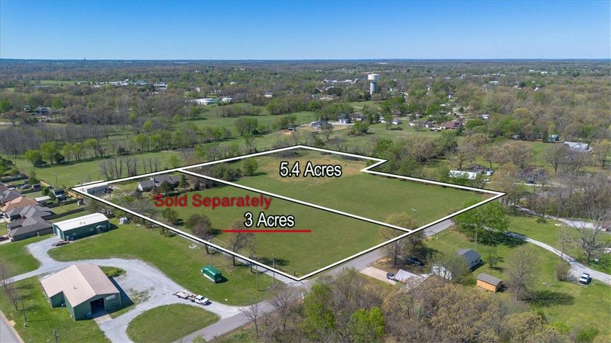 Looking for the perfect spot to build your mini-empire? This 5.4-acre slice of Gravette gold is ready and waiting! Located in a prime spot near Gravette High School, this land offers the ultimate blank canvas. Whether you’re dreaming of a sprawling private estate where you can’t see your neighbors or looking to develop multiple homes, this acreage has the space and the potential to make it happen.

The logistics are already heading in the right direction: public water and electric are right at the street. For waste, you’re set for a septic system, or you can check with Gravette Water & Utilities about sewer availability nearby.

It’s rare to find this much flat, usable land so close to town amenities and schools. No house, no headaches—just 5.4 acres of opportunity. Whether you're a developer with a vision or a homeowner wanting to build the ultimate custom retreat with room for a massive shop (or three), this is the one. Come walk the dirt and start planning your kingdom