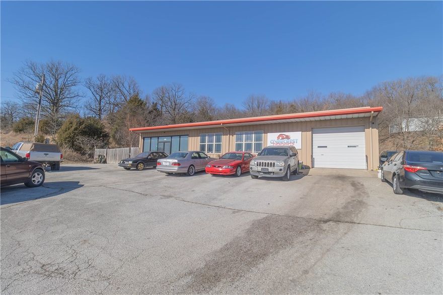 Excellent opportunity to establish or expand your business. This property offers prime Highway 412 frontage and features a 3,500± SF metal building constructed in 2006, including an office and restroom. Situated on approximately 1.2± acres, the site provides ample parking and easy access, along with an overhead door for functionality. Two car lifts may convey with an acceptable offer. Come view this prime location today!