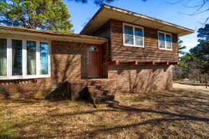 You provide the sweat, we provide the equity. A little TLC, and you can have a home in a perfect location between Russellville and Dover. Featuring 2,156 sq. foot, 4 bedrooms, 3.5 bathrooms, two living rooms, separate laundry room, and a large eat in Kitchen with lots of counter space. Downstairs you can enjoy a fire beside the wood burning stove, or hang out in the screened in porch out back. All this on an extra large lot and a barn ready for your fur friends.