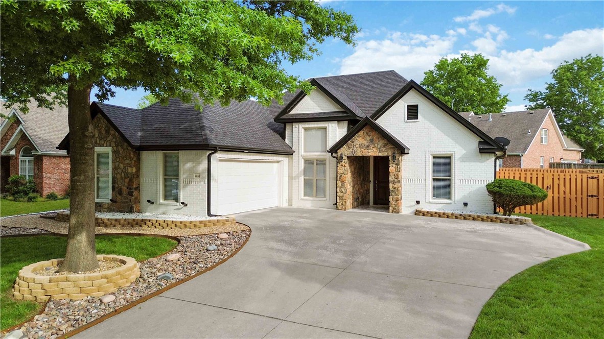 Impeccably Renovated Home with Premium Upgrades! Experience modern comfort in this fully renovated, move-in-ready home. Fresh interior and exterior paint, soaring ceilings, and wood flooring create a bright, open feel. The updated kitchen features granite countertops, a new electric range, and a dishwasher. Major systems including the roof, HVAC, and water heater have been replaced. A garage that includes insulated garage doors, epoxy floors and built-in cabinetry, while additional built-ins in the living area and primary suite add style and storage. A spacious attic and landscaped yard complete this exceptional property. Schedule your showing today!