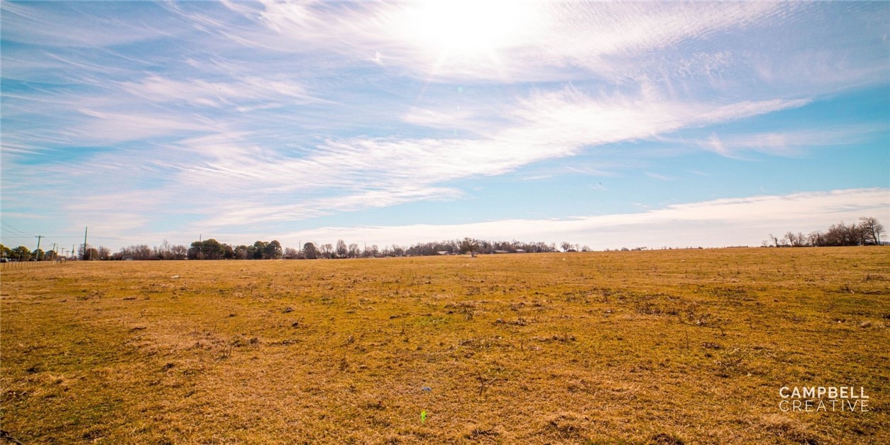 Great Development Potential, Listing includes 37+/- Acres of C-2 Zoned mostly level property. Will divide with accepted offer in increments of 2 - 37 Acres. Ideal for development of Retail Space, Neighborhood, Apartments, Professional Space, Entertainment, Dining.
The opportunities are endless. 1300 feet of frontage on W Pleasant Grove Rd, and 1200 feet of frontage on Concord St. Formerly a grape vineyard and farm. Includes two parcels with existing house and outbuildings. Property is perfect location to capitalize on the extensive Professional, Retail and Food Service traffic in one of Northwest Arkansas prime business districts. Close to shopping, dining, sports, entertainment, medical services, schools, financial center. Go to video at following Link: https://vimeo.com/518353479