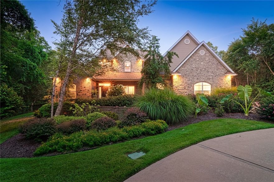 This beautiful and private two-story home is nestled on over seven acres only minutes from Downtown Bentonville.  The spacious and fenced-in wooded backyard is an entertainer’s dream with a heated pool, screened-in porch and a fully-wired music studio. The open-concept kitchen has a large island, granite countertops, and double oven. On the main floor of the home, you will discover the primary bedroom and en-suite bathroom, a separate downstairs guest room/office with a full bath, and all new updated hardwood floors. The upstairs features three bedrooms, one with a hidden room and the other with an over-sized walk-in closet, and two full baths. The state-of-the-art theatre room has an amazing sound system, theatre seating, mini kitchen and half bath. The large shop on 5 acres of the property includes an RV electric hookup, is heated and cooled, and more. An exquisite property like this doesn’t come along often!