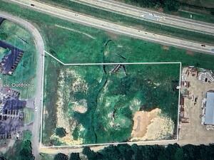 INTERSTATE VISIBILITY!!! This 4 acre lot has 500ft of Interstate frontage!! Currently zoned Industrial, this location is a prime spot to be noticed. So many possibilities!!